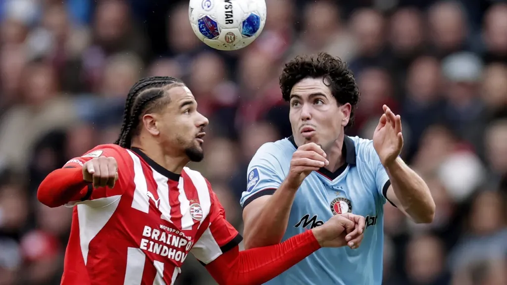 League leader Feyenoord fends off PSV attack in a gripping top match