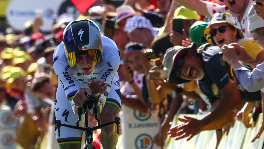 Unassailable Evenepoel wins time trial; podium contender Lipowitz abandons Tour